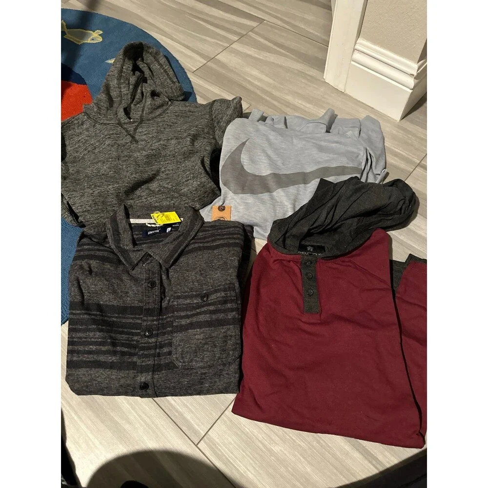 Four brand new with tags extra large boys long sleeve tops.